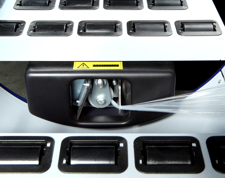 水平式缠膜机断膜和夹膜机构